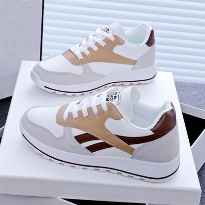 Witte sportsneakers voor dames, geschikt voor studenten en hardlopers.